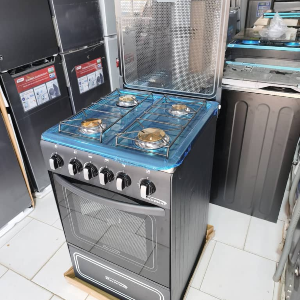 Gazinière 4 feux 🔥2 fours Allumage automatique  Marque : Universal